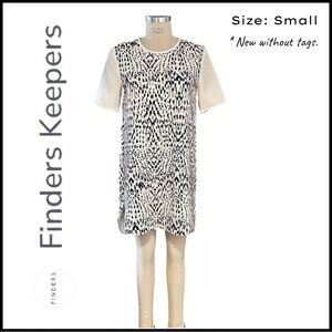 Finders Keepers Comfortable Dress w/ Dolphin Hem. Perfect for Day to Night!